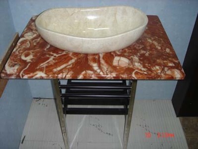 Stone bathroom sinks, granite sinks, marble sinks, bath fixtures, bath basins, undermount sinks, pedestal, self rimming, vessel mount, vessel, wall hung.